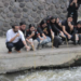 Penuangan Eco Enzym di Sungai Taman Lumintang